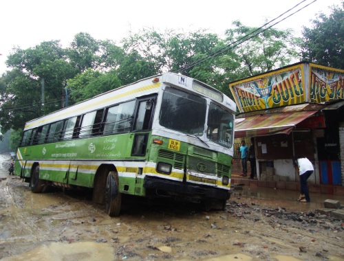 DTC Bus stuck in wet mud